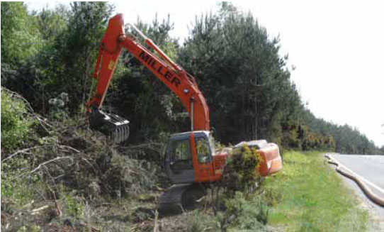 Photo B8.9 Heavy machinery being used to clear scrubland