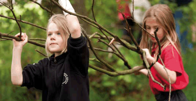 children playing with branches